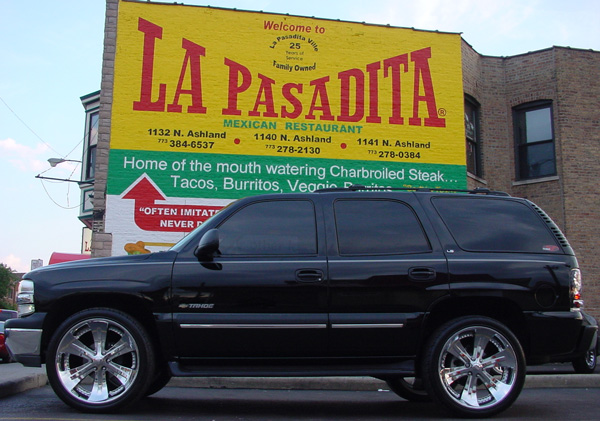 Rene's truck parked in front of La Pasadita Restaurant Sign... That's what I call Advertising!!!